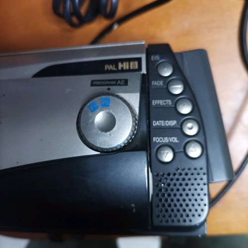 Hitachi video camera used with foldable screen and VHS cassette