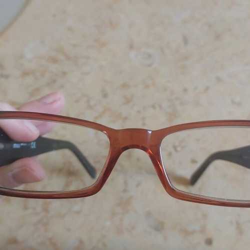 Miu Miu eyeglasses used with purple and orange acetate frame