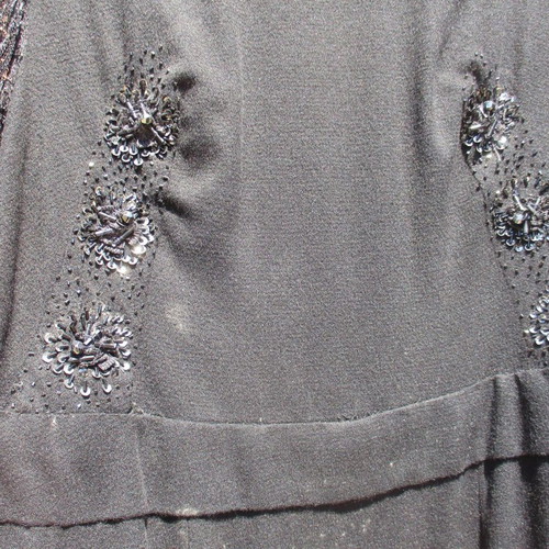 Vintage women's dress used from the 1960s with lace sleeves black