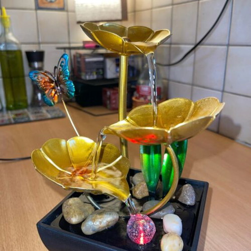 Indoor fountain with LED lighting and stones