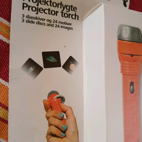 Mini projector and soft doll like new pack