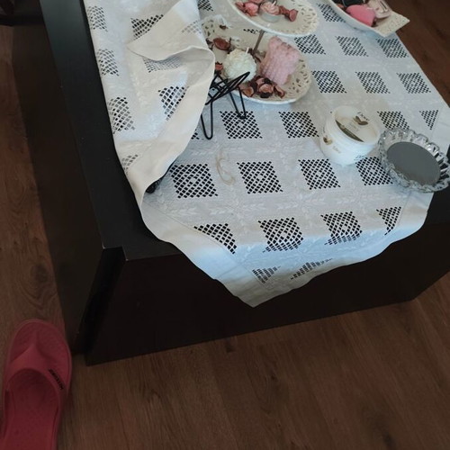 Coffee table with storage compartment