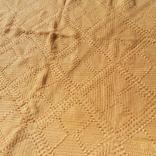 Handmade knitted blanket and pillowcase used