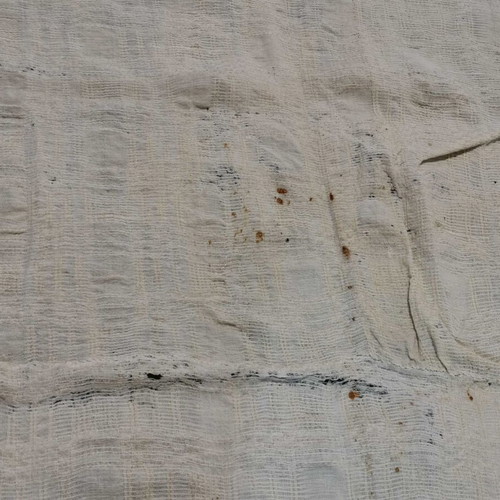 Wool woven bed sheet used with stain and wear from 1930 era