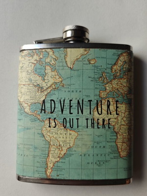 Vintage metal flask "Adventure Is Out There" with world map design
