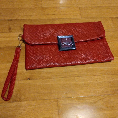 Vintage style red clutch unused with clasp and wrist strap