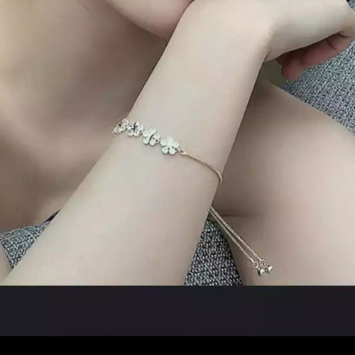 Delicate cubic zirconia bracelet new, gold and white