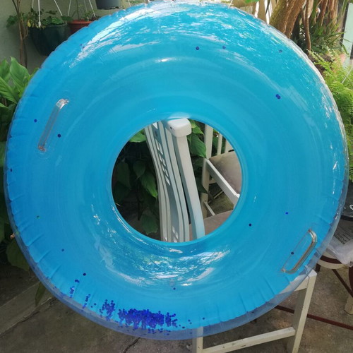 Two large inflatable rings used, one with blue glitter