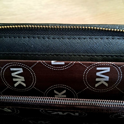 Michael Kors wallet used, black with gold monogram