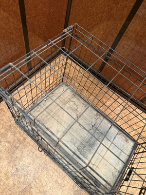 Metal Pet Crate used, durable for medium-sized dogs