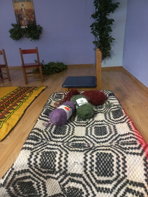Handwoven vintage rug used in black, white and red tones