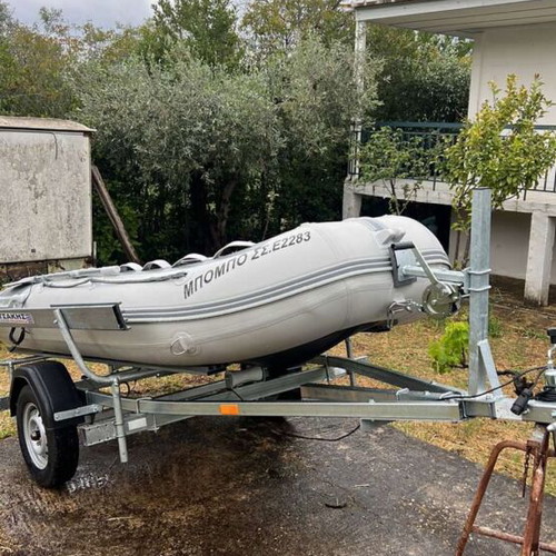 Neptune 330 inflatable boat with Mercury 9.9 outboard motor