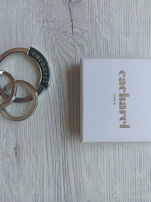 Cacharel women's keychain like new, gray