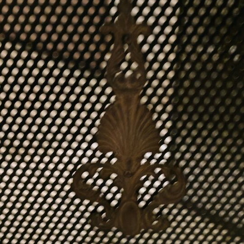 Bronze fireplace cover like new with gold details