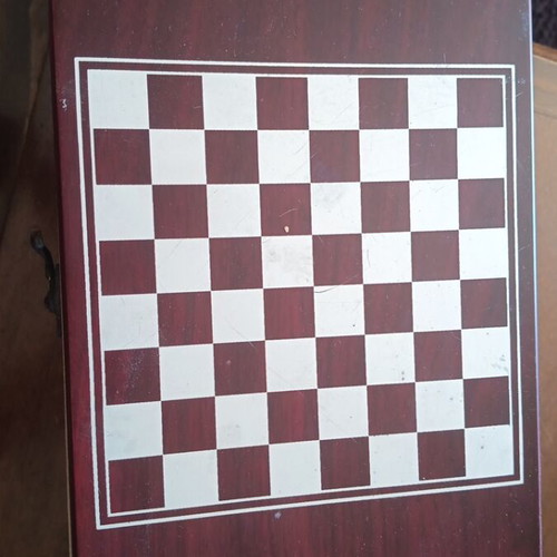 Chess and wooden wine holder used