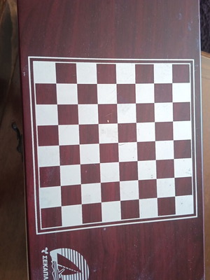 Chess and wooden wine holder used