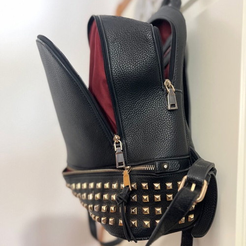 Black backpack used with studs
