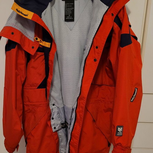 Ski and mountaineering jacket like new, red with blue details, medium