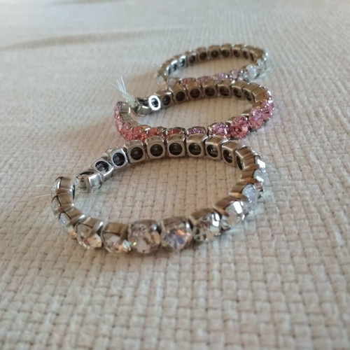 Set of three tennis bracelets like new, pink and white