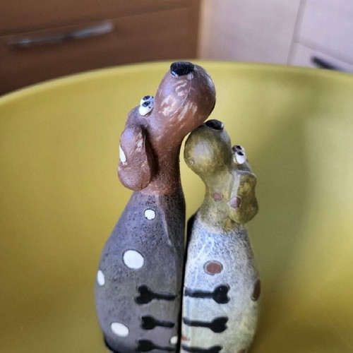 Decorative dogs like new in earthy tones