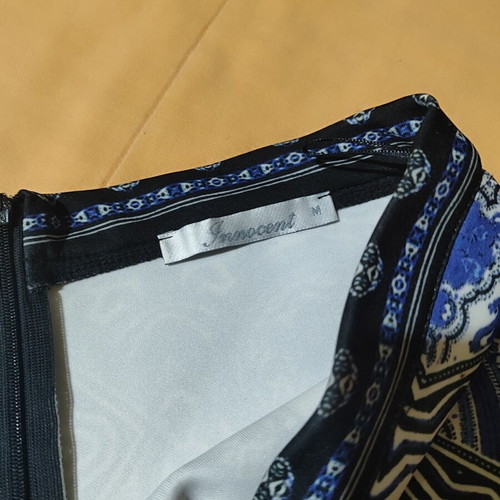 Innocent pencil skirt with print and back slit, black and blue