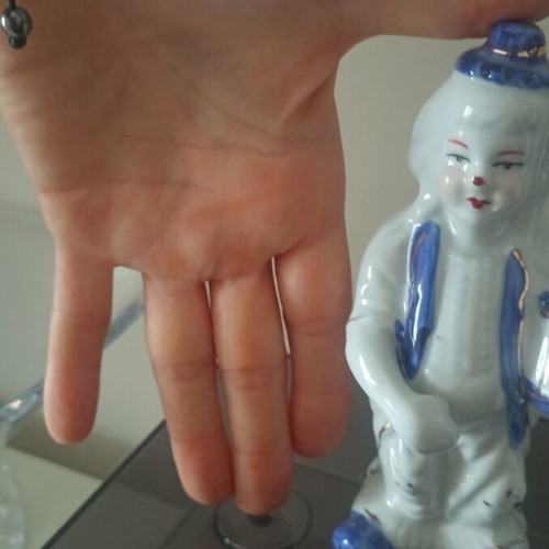 Porcelain figurines set of 3 like new