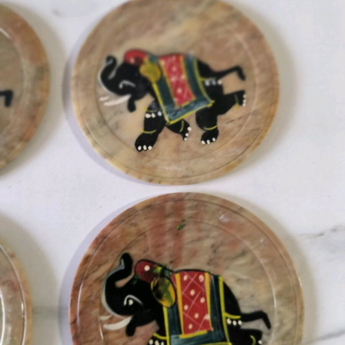 Marble coasters used with elephant painting from India
