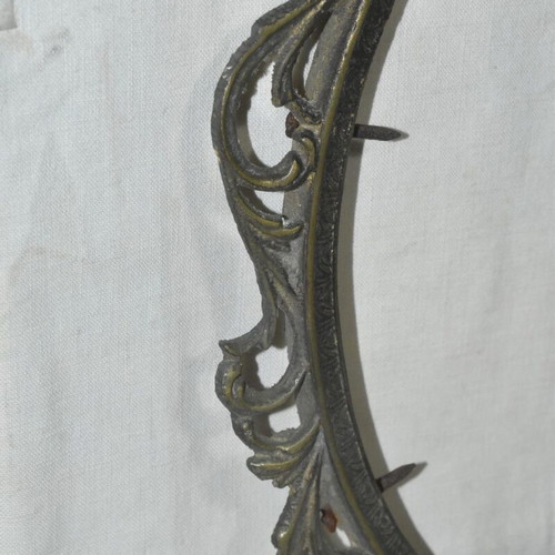 Brass oval frame used with embossed vintage design