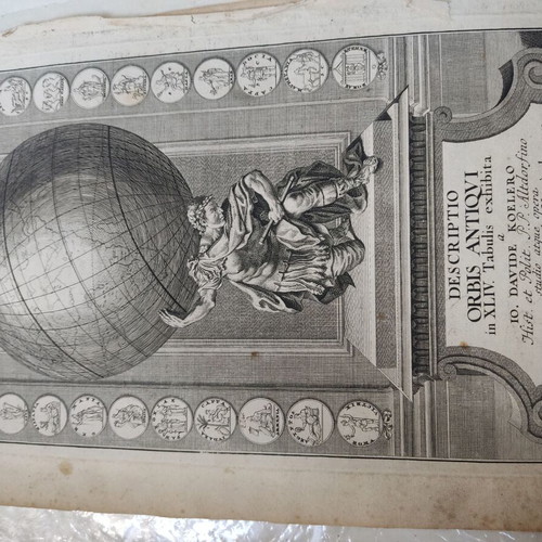 Engraving book frontispiece used with hero Atlas holding the earth