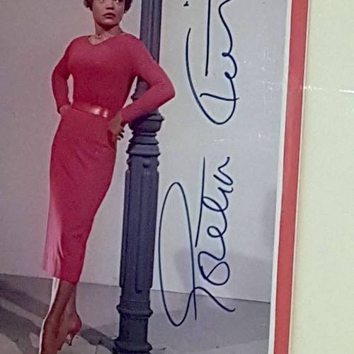 Eartha Kitt autograph in framed glass used