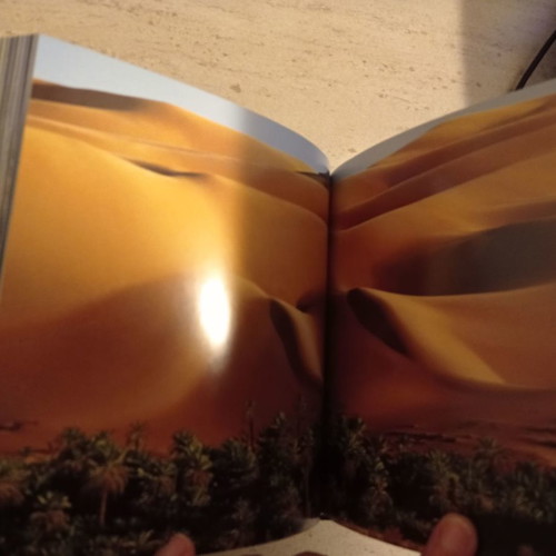 Earth Cube Book like new with aerial photos, 727 pages