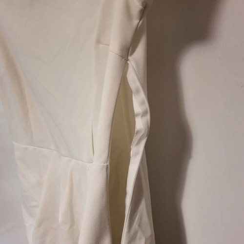 White dress like new with short sleeves and front pleat