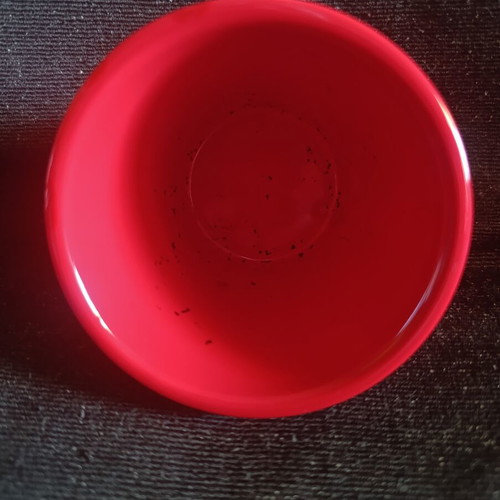 Ceramic pot with embossed heart like new, red color