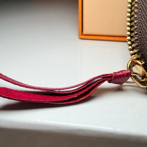 Louis Vuitton Clémence wallet used, monogram canvas with pink zipper
