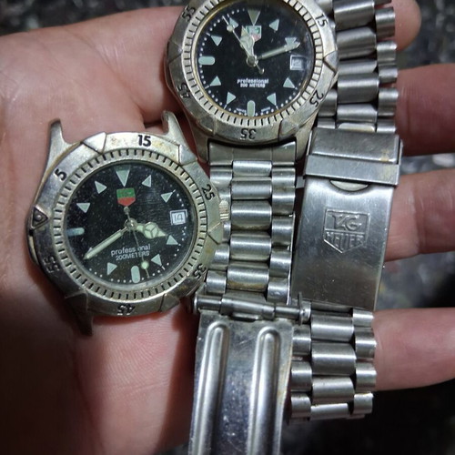 Taugh Heuer wristwatch used, one needs crown