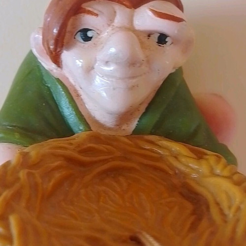 Disney figure Quasimodo holding a nest used
