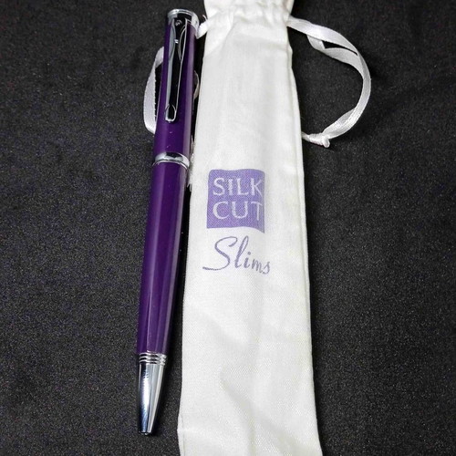 Silk Cut pack used with pen, matches and lighter