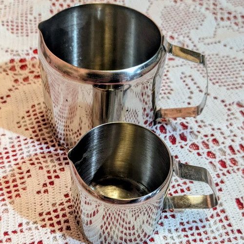 Professional stainless steel milk pitchers and coffee stencil