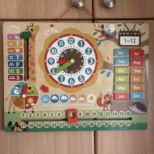 Magnetic Educational Toy with Months, Hours, Seasons, and Days Like New