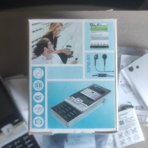Sony Ericsson T715 box with original accessories and non-working device used