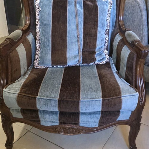 Pair of classic wingback armchairs with striped fabric
