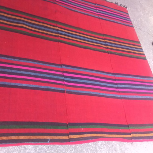 Authentic 100 percent handwoven wool rug used