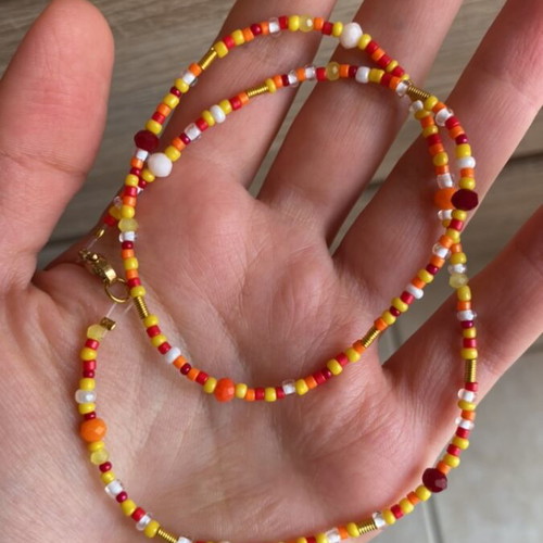 Handmade necklace colorful in red, orange and yellow