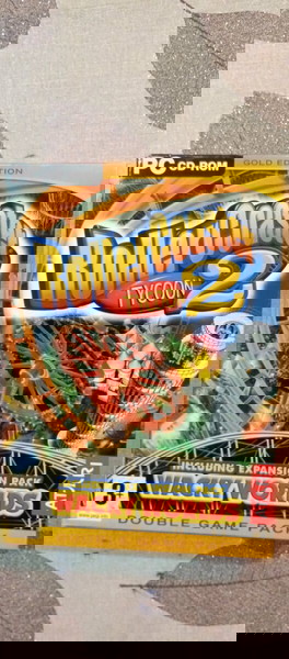 PC CD -ROM ROLLER COASTER TYCOON 2