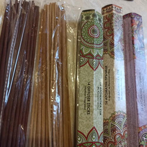Aromatic incense sticks with wooden base, assorted scents
