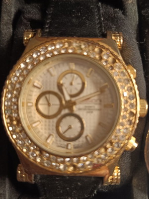 Dissoni women's watch used with some fallen stones, black