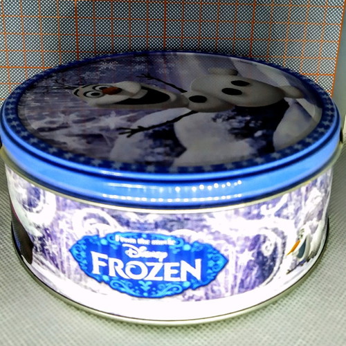 Metal round Frozen tin with Olaf Disney store used