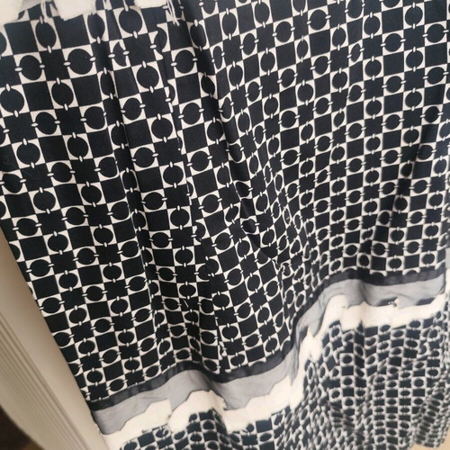 Two-tone dress used with embossed details