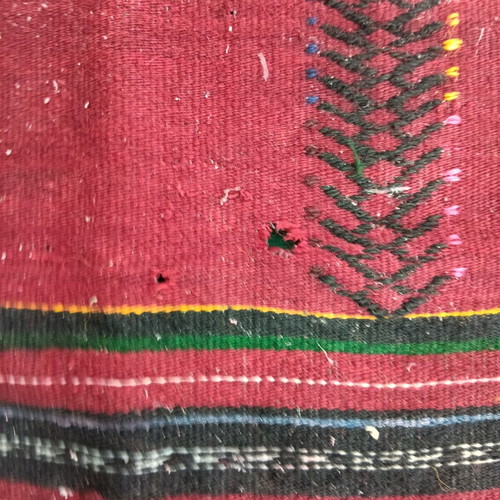 Red striped traditional costume apron used with wear