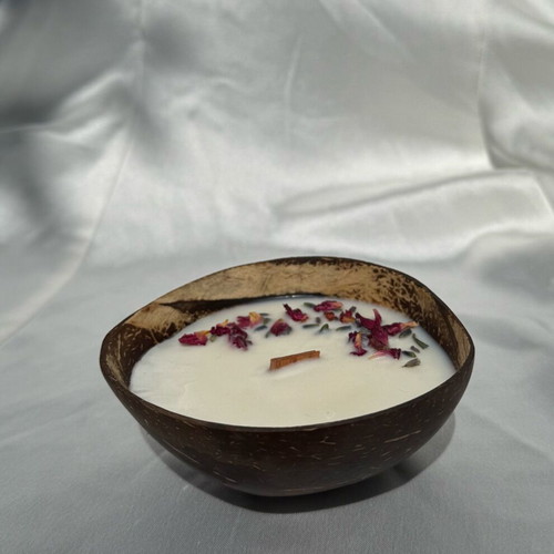 Handmade soy candle in natural coconut with dried flowers